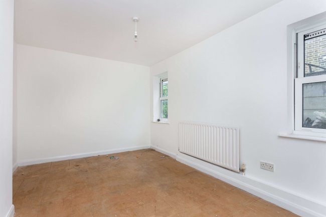 Flats A B & C, 51 High Street Colliers Wood, London SW19 2JF
 1