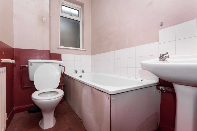 Flats A B & C, 51 High Street Colliers Wood, London SW19 2JF
 1