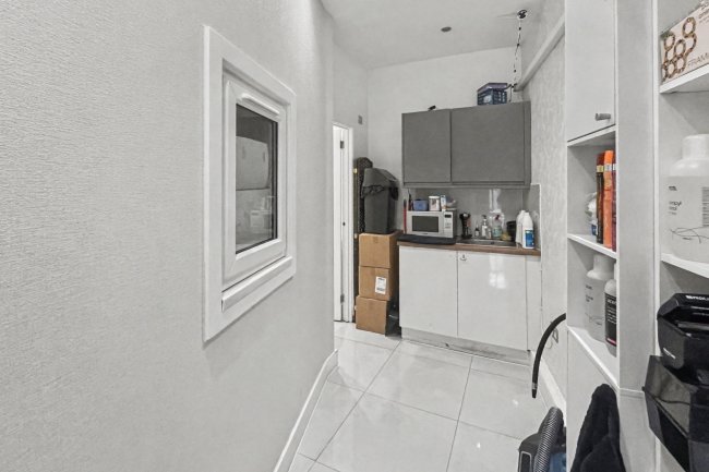 22 Woodcote Road, Wallington SM6 0NN 5